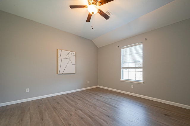 1510 Pecan Trace Ct, Sugar Land, TX 77479 - spare room with a ceiling fan, wood finished floors, lofted ceiling, and baseboards