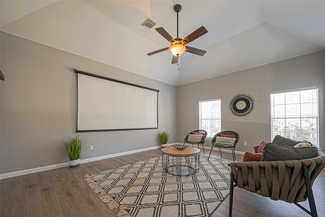 1510 Pecan Trace Ct, Sugar Land, TX 77479 - home theater with lofted ceiling, a ceiling fan, visible vents, baseboards, and wood finished floors