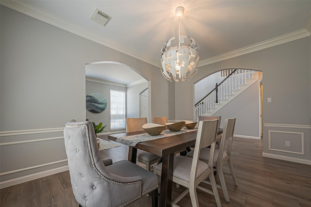 1510 Pecan Trace Ct, Sugar Land, TX 77479 - dining room with arched walkways, an inviting chandelier, wood finished floors, stairway, and visible vents