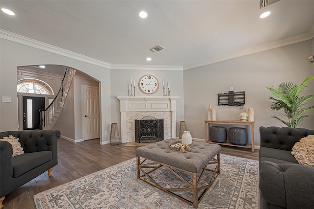 1510 Pecan Trace Ct, Sugar Land, TX 77479 - living room with baseboards, stairway, arched walkways, and ornamental molding