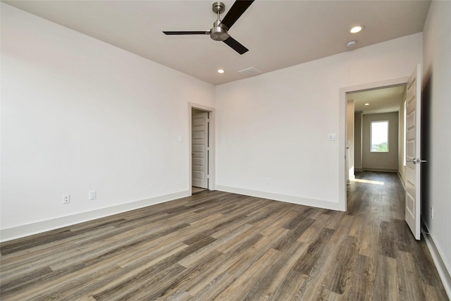 unfurnished bedroom with wood finished floors, ceiling fan, recessed lighting, and baseboards
