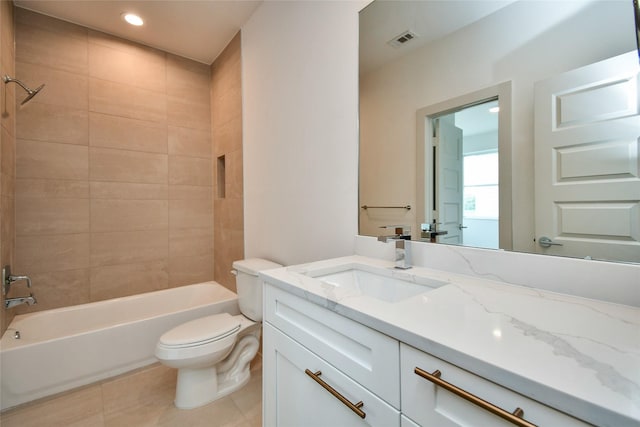 full bath with shower / tub combination, visible vents, toilet, tile patterned floors, and vanity