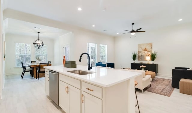 1575 Little Cypress Loop, Orange, TX 77632 - kitchen with open floor plan, a sink, dishwasher, a chandelier, and recessed lighting
