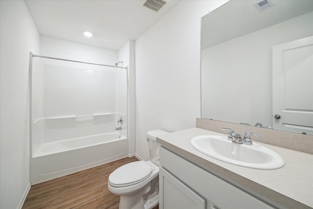 8834 Wooster Trails Dr, Baytown, TX 77521 - full bath featuring vanity, toilet, wood finished floors, and visible vents