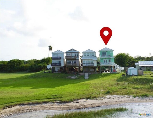 106 Clement Cv, Port Lavaca, TX 77979 - view of home's community featuring a yard