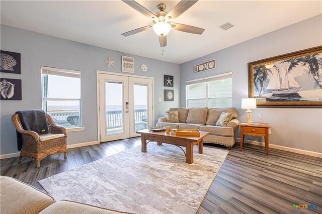 106 Clement Cv, Port Lavaca, TX 77979 - living room with wood finished floors, visible vents, french doors, and a ceiling fan