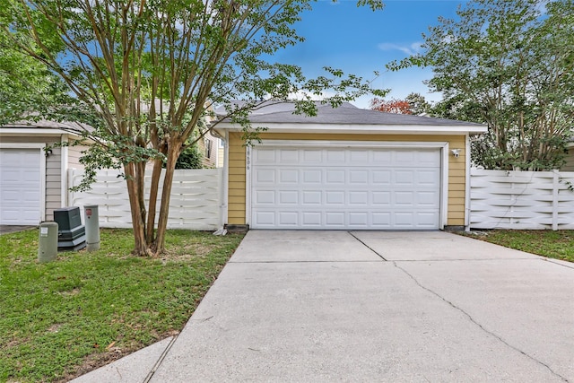 detached garage with fence
