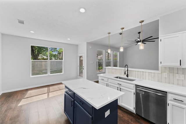 kitchen featuring dishwasher, a sink, white cabinetry, visible vents, and dark wood-type flooring