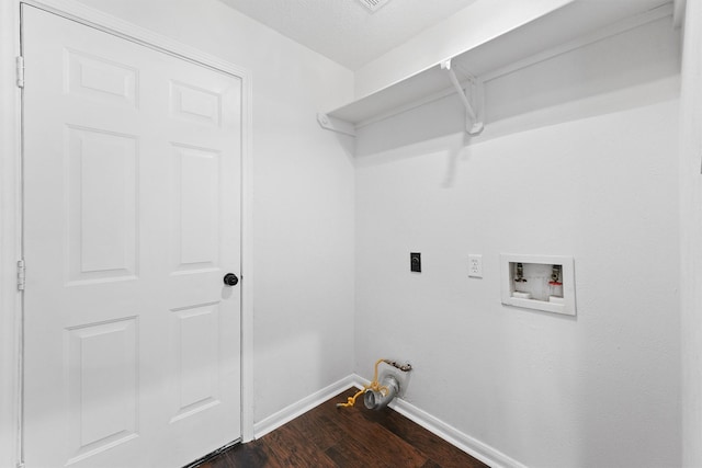 washroom with dark wood-style floors, hookup for an electric dryer, washer hookup, laundry area, and baseboards