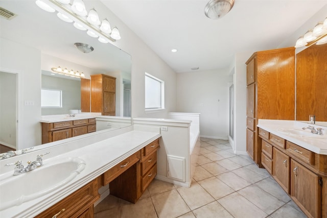 331 Moonshine Hill Rd, Houston, TX 77338 - bathroom featuring a sink, a wealth of natural light, and visible vents