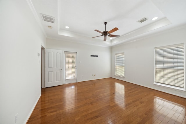 331 Moonshine Hill Rd, Houston, TX 77338 - empty room featuring a tray ceiling, a wealth of natural light, visible vents, and ornamental molding