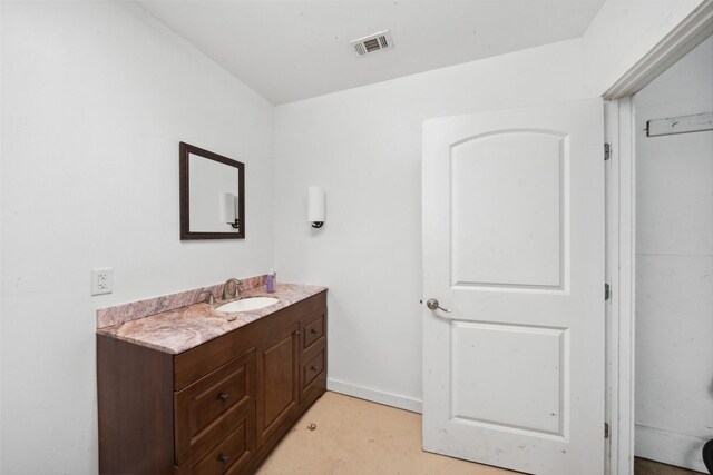 331 Moonshine Hill Rd, Houston, TX 77338 - bathroom with vanity, baseboards, and visible vents