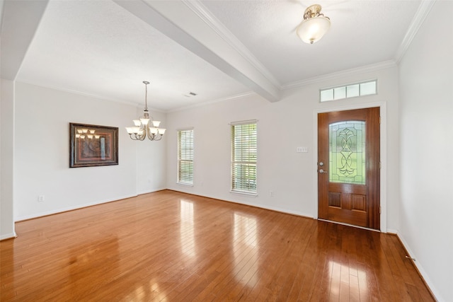 331 Moonshine Hill Rd, Houston, TX 77338 - foyer entrance with hardwood / wood-style flooring, baseboards, ornamental molding, and a notable chandelier