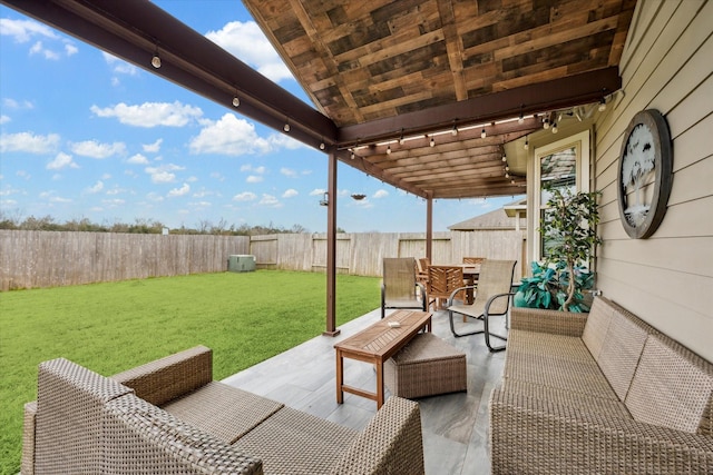view of patio / terrace with an outdoor living space, outdoor dining area, and a fenced backyard