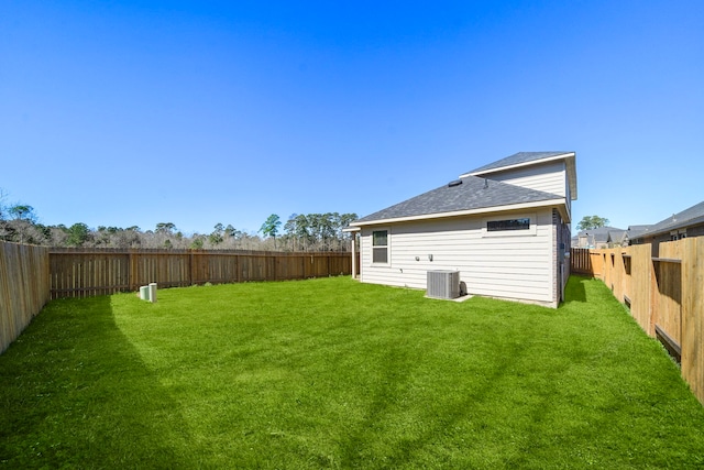 9993 Mountain Lion Ln, Magnolia, TX 77354 - view of yard with central AC and a fenced backyard