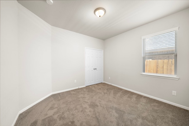 9993 Mountain Lion Ln, Magnolia, TX 77354 - carpeted empty room featuring baseboards