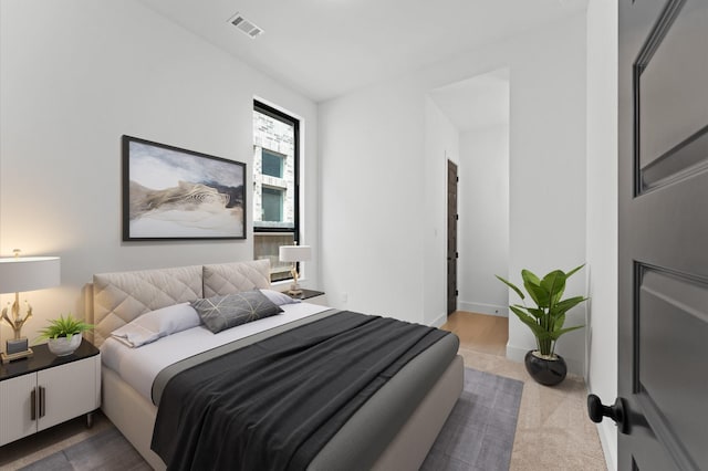 bedroom with visible vents