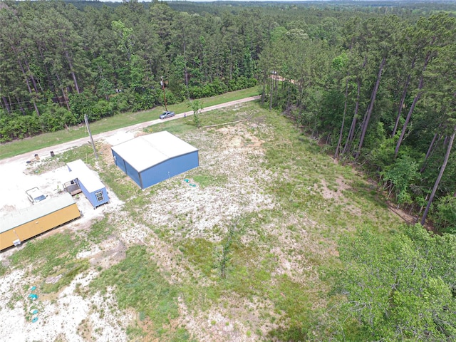 bird's eye view with a forest view