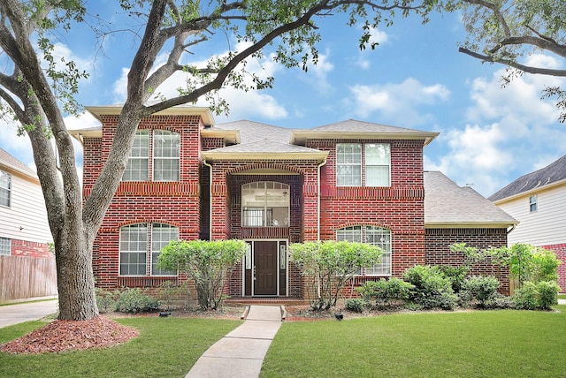 5127 Plantation Colony Dr, Sugar Land, TX 77478 - traditional-style house featuring brick siding and a shingled roof