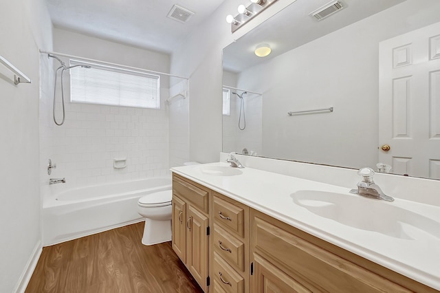 5127 Plantation Colony Dr, Sugar Land, TX 77478 - full bathroom with wood finished floors, bathing tub / shower combination, toilet, and double vanity