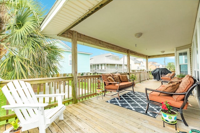 wooden deck with area for grilling