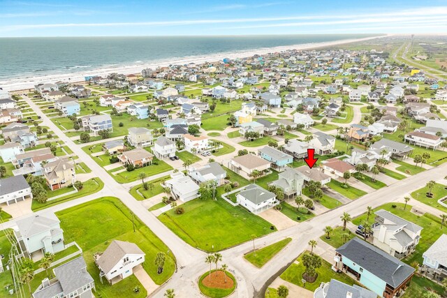 birds eye view of property with a residential view and a water view