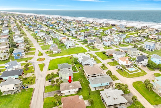 bird's eye view with a residential view and a water view