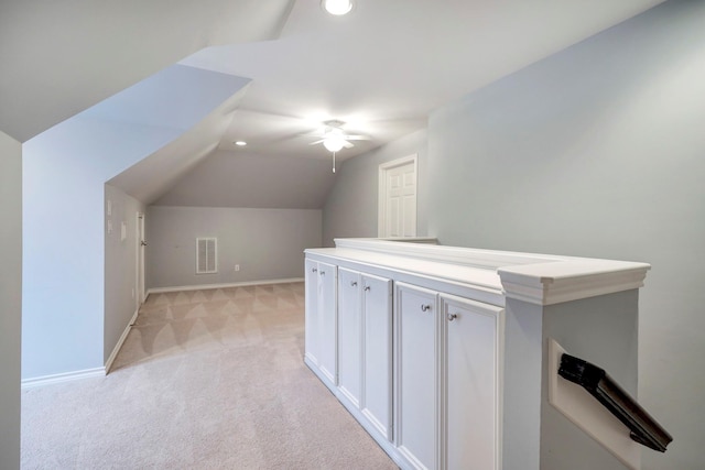 bonus room featuring a ceiling fan, visible vents, baseboards, light carpet, and recessed lighting