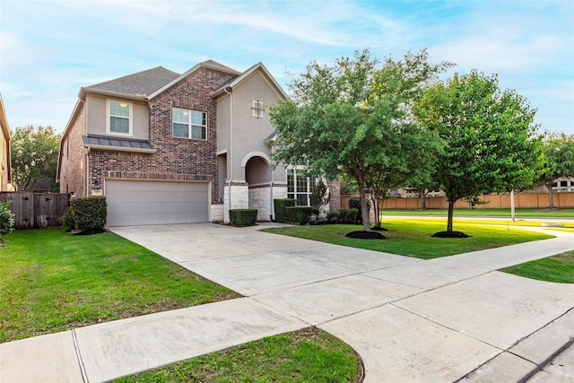 3302 Indigo Acres Ct, Katy, TX 77494 - traditional-style home with stucco siding, fence, a garage, a front yard, and concrete driveway