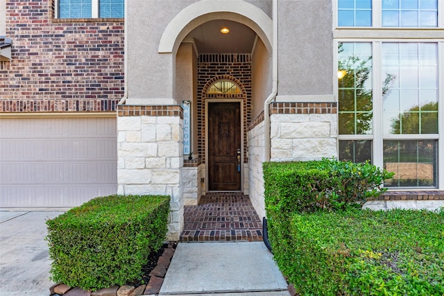 3302 Indigo Acres Ct, Katy, TX 77494 - property entrance featuring stucco siding, brick siding, and stone siding