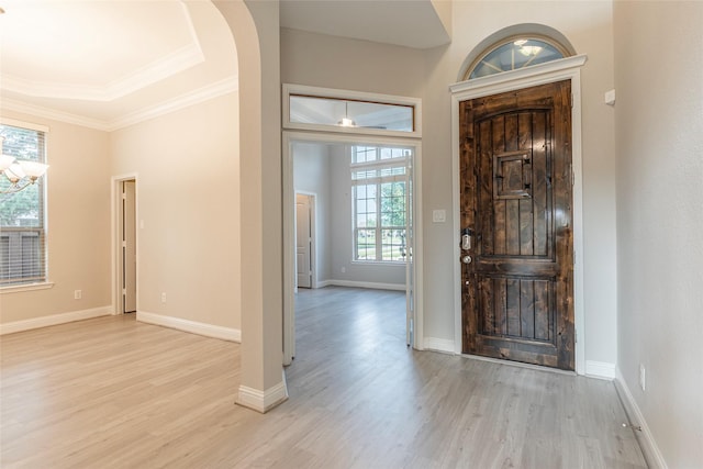 3302 Indigo Acres Ct, Katy, TX 77494 - entrance foyer with wood finished floors, baseboards, ornamental molding, and arched walkways
