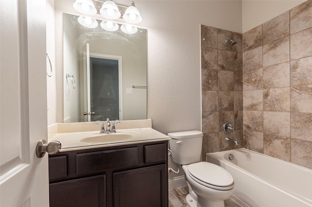 3302 Indigo Acres Ct, Katy, TX 77494 - bathroom featuring shower / bathing tub combination, a textured wall, toilet, and vanity