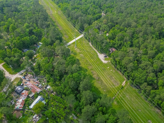 drone / aerial view with a view of trees