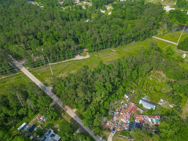 bird's eye view featuring a forest view