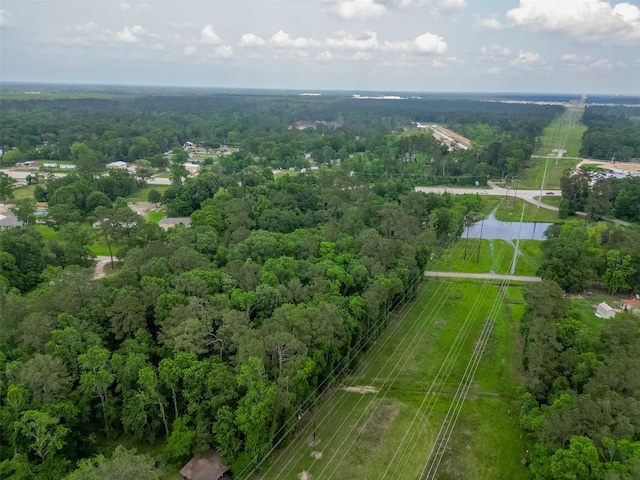 bird's eye view featuring a forest view