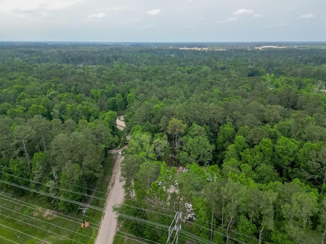 aerial view with a wooded view