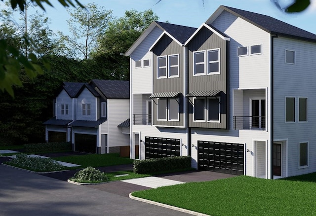 view of property featuring an attached garage, board and batten siding, and concrete driveway