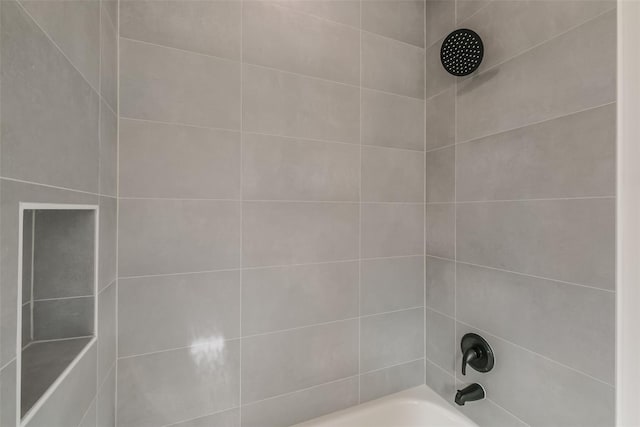 bathroom with shower / bathing tub combination