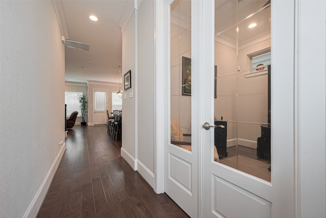 8820 Ashbloom Ln, Houston, TX 77080 - corridor featuring baseboards, dark wood finished floors, ornamental molding, and recessed lighting