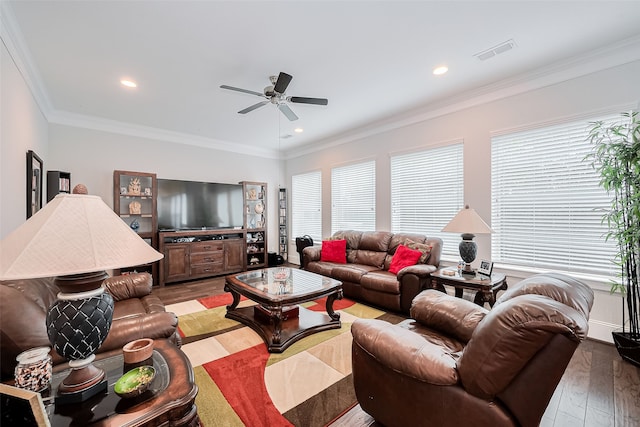 8820 Ashbloom Ln, Houston, TX 77080 - living area featuring light wood finished floors, ceiling fan, healthy amount of natural light, ornamental molding, and recessed lighting