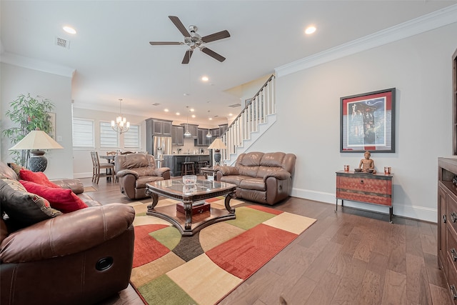 8820 Ashbloom Ln, Houston, TX 77080 - living area with ornamental molding, a ceiling fan, baseboards, wood finished floors, and stairs