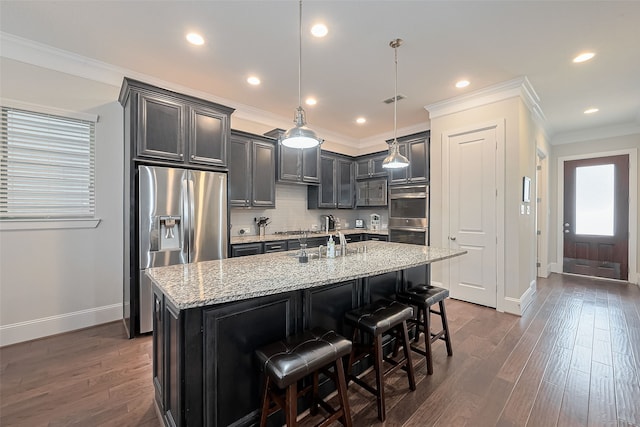 8820 Ashbloom Ln, Houston, TX 77080 - kitchen with stainless steel appliances, baseboards, a sink, dark wood-style floors, and crown molding