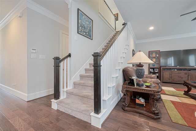 8820 Ashbloom Ln, Houston, TX 77080 - staircase with crown molding, wood finished floors, baseboards, and recessed lighting