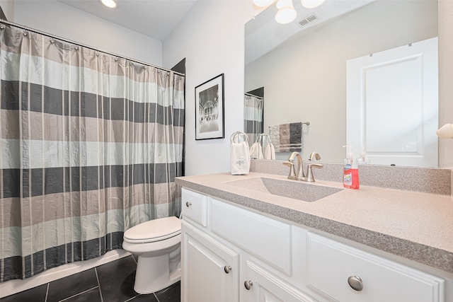 8820 Ashbloom Ln, Houston, TX 77080 - full bathroom with toilet, tile patterned flooring, vanity, and a shower with shower curtain