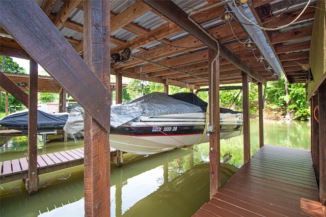 70 Lower Cove Dr, Point Blank, TX 77364 - dock area with boat lift and a water view