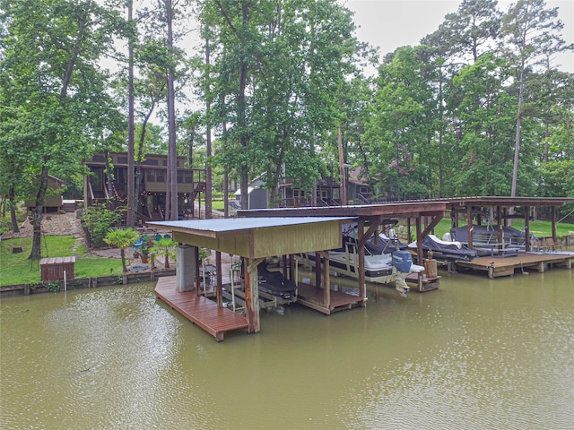 70 Lower Cove Dr, Point Blank, TX 77364 - dock area featuring boat lift and a water view