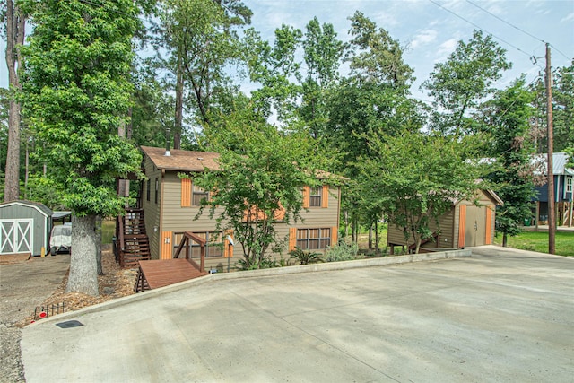 70 Lower Cove Dr, Point Blank, TX 77364 - view of front of house with stairway