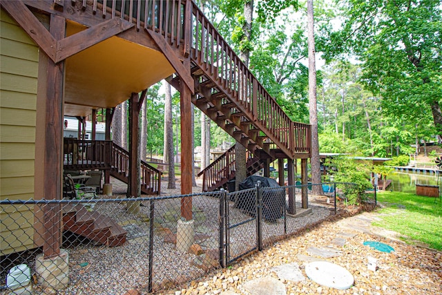 70 Lower Cove Dr, Point Blank, TX 77364 - fenced backyard featuring stairs