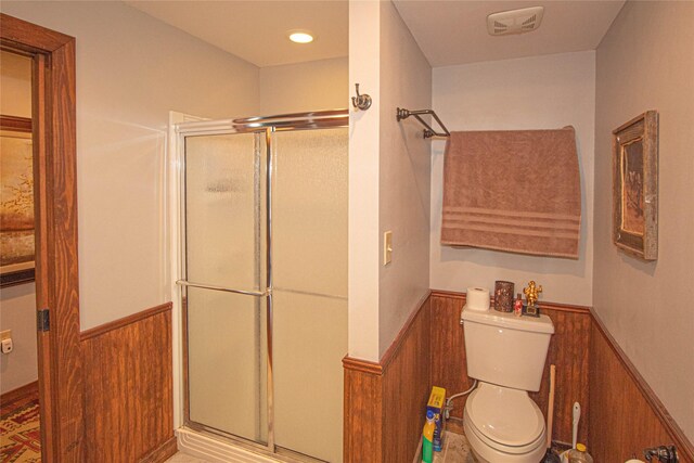 70 Lower Cove Dr, Point Blank, TX 77364 - bathroom featuring a wainscoted wall, a stall shower, toilet, and wooden walls