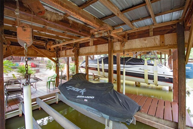 70 Lower Cove Dr, Point Blank, TX 77364 - dock area featuring boat lift